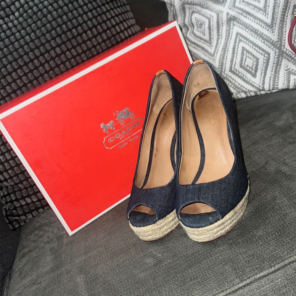 Coach wedges Jean